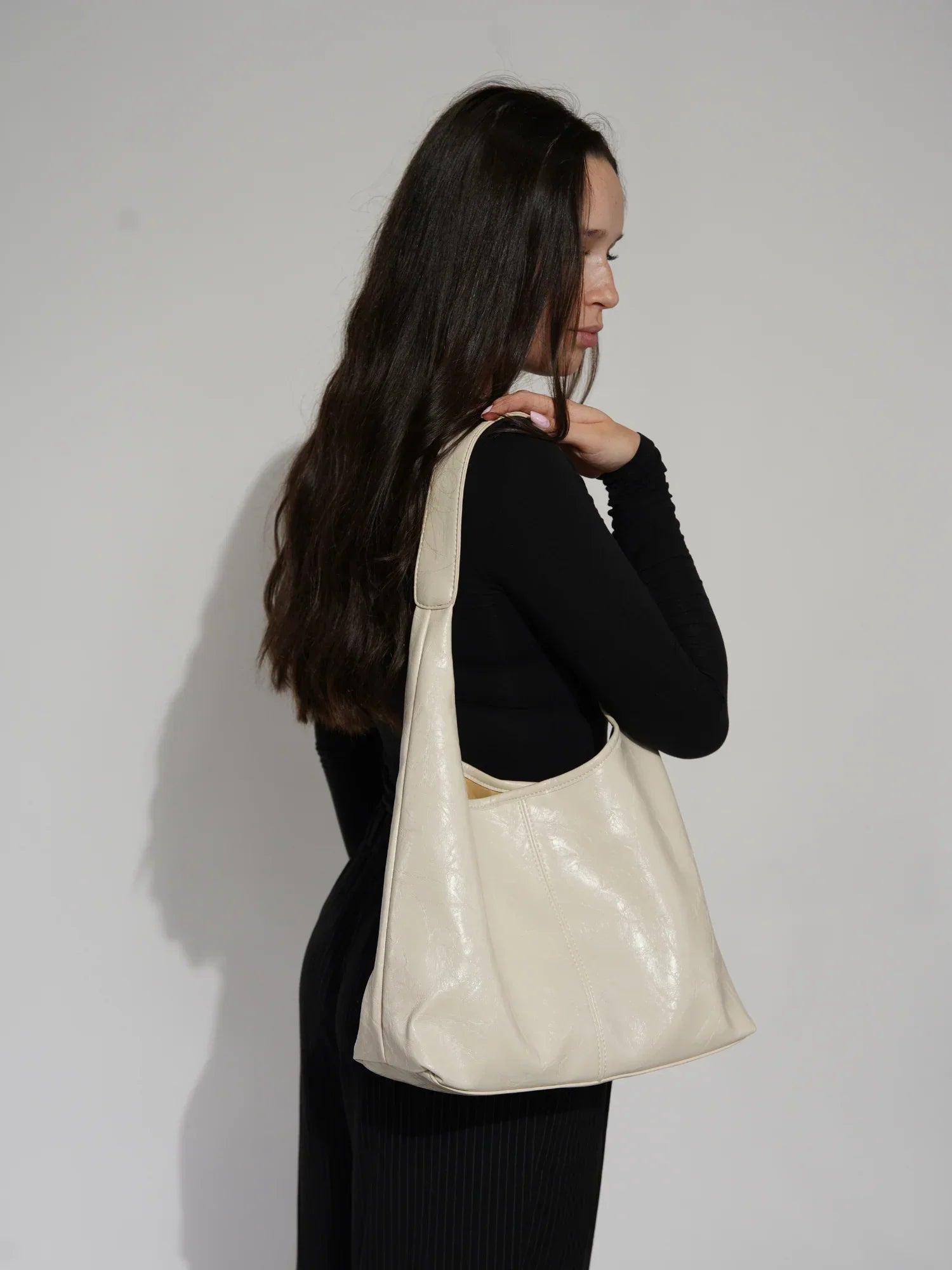 Glow | Elegant axelremsväska